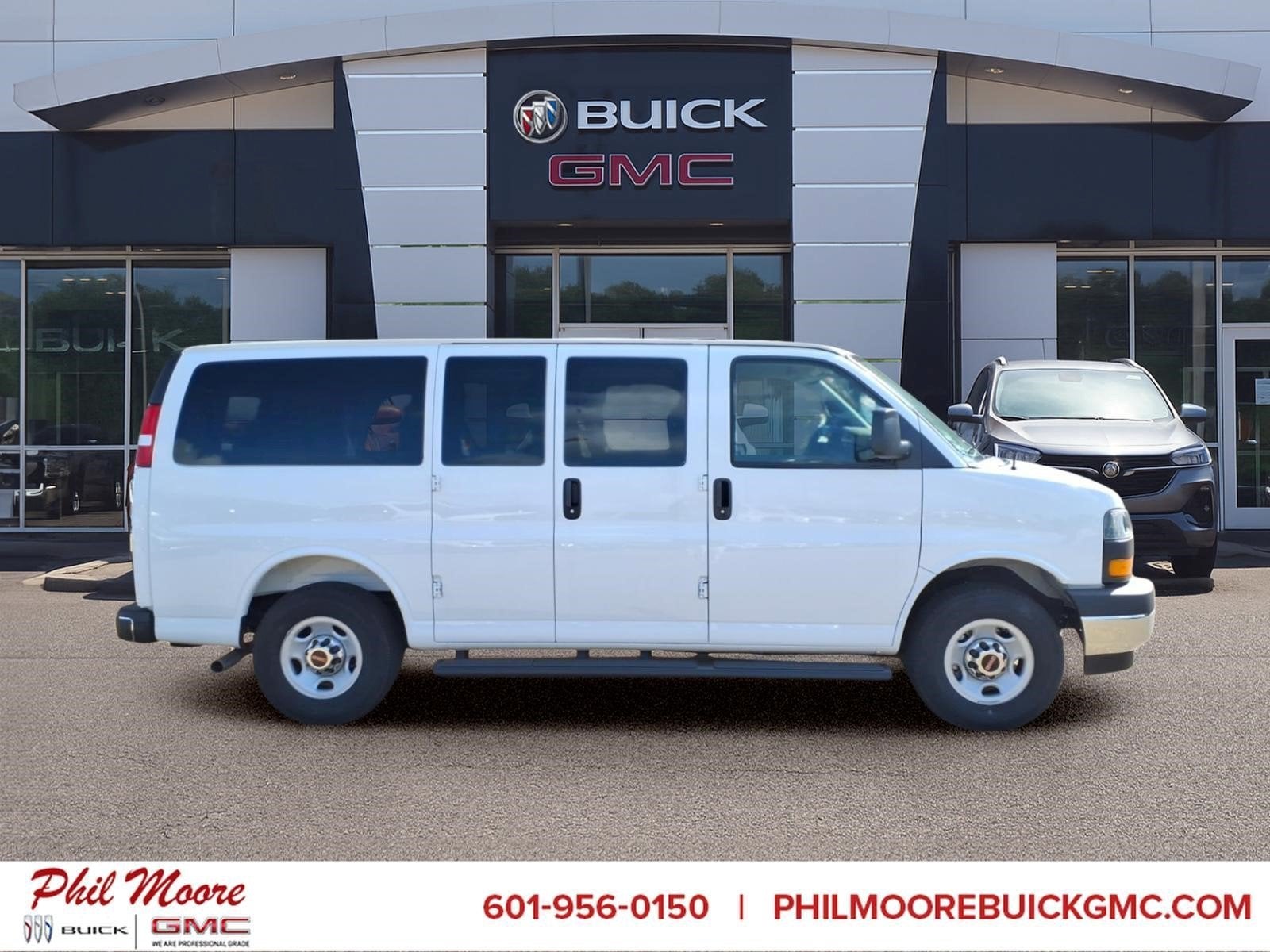 2025 GMC Savana Passenger LT in Summit White — front three-quarter view