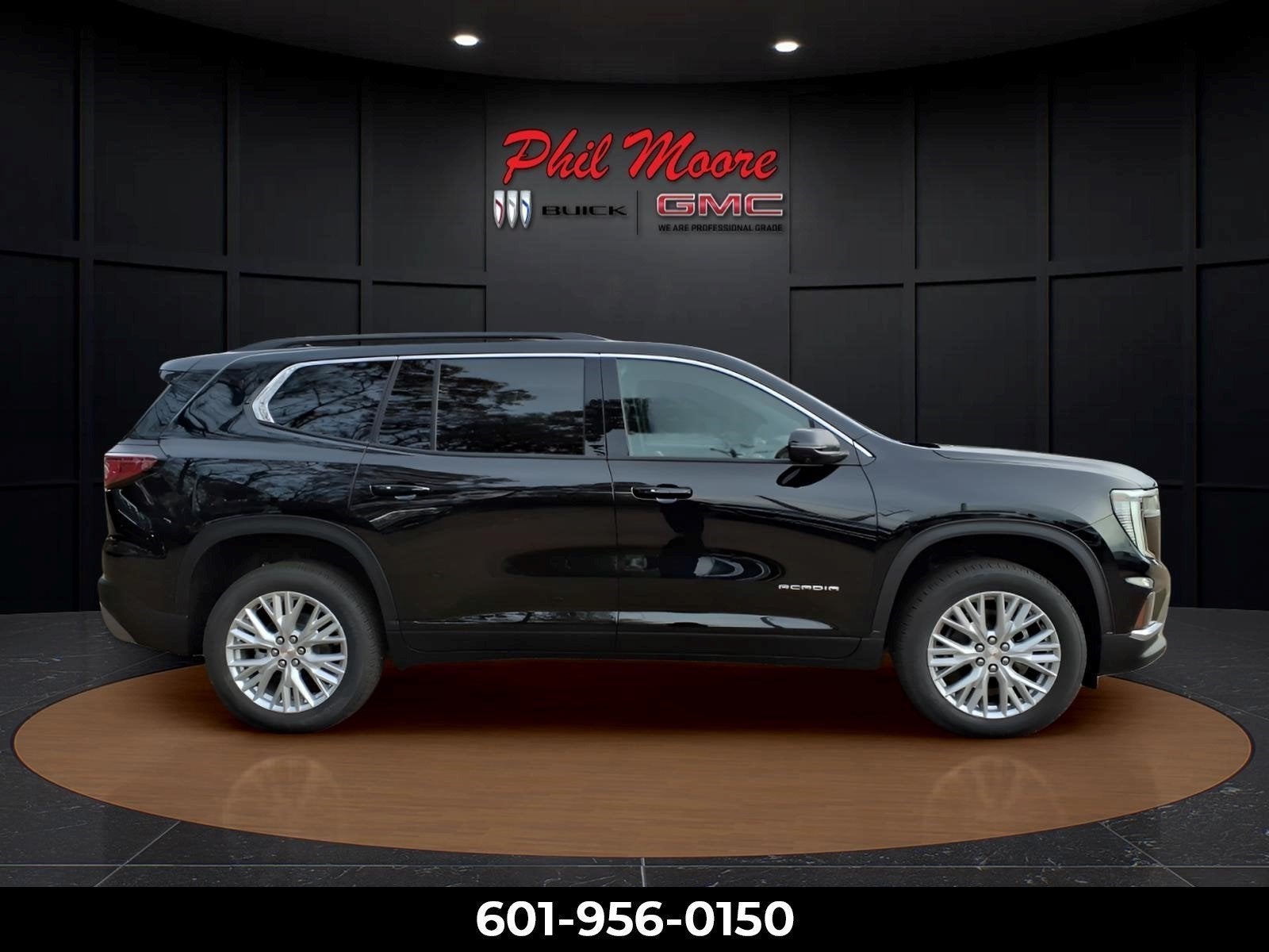 2026 GMC Acadia Elevation in Ebony Twilight Metallic — front three-quarter view