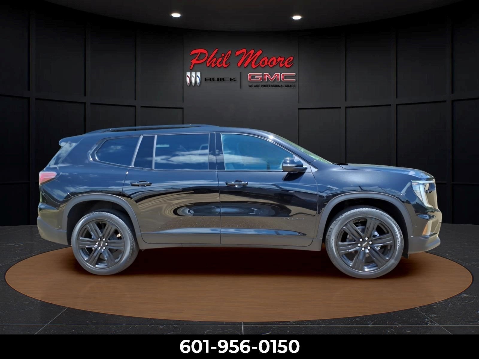 2026 GMC Acadia Elevation in Ebony Twilight Metallic — front three-quarter view