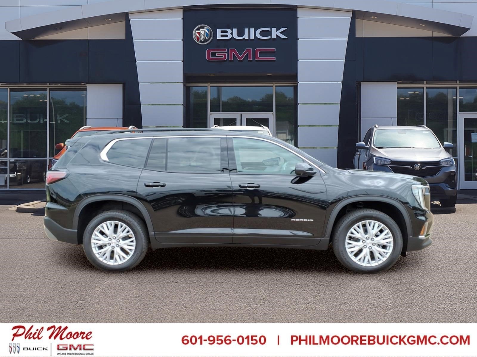 2026 GMC Acadia Elevation in Ebony Twilight Metallic — front three-quarter view