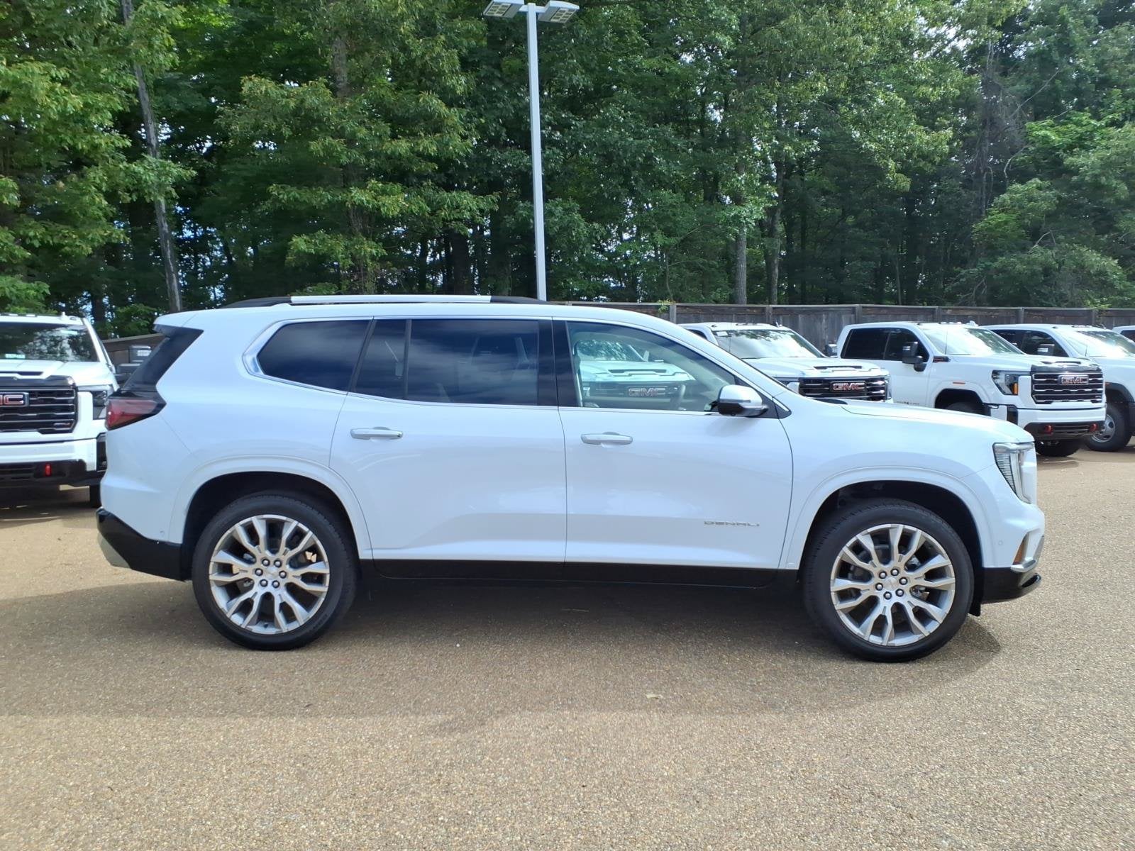 2026 GMC Acadia Denali in Glacier White Tricoat — front three-quarter view