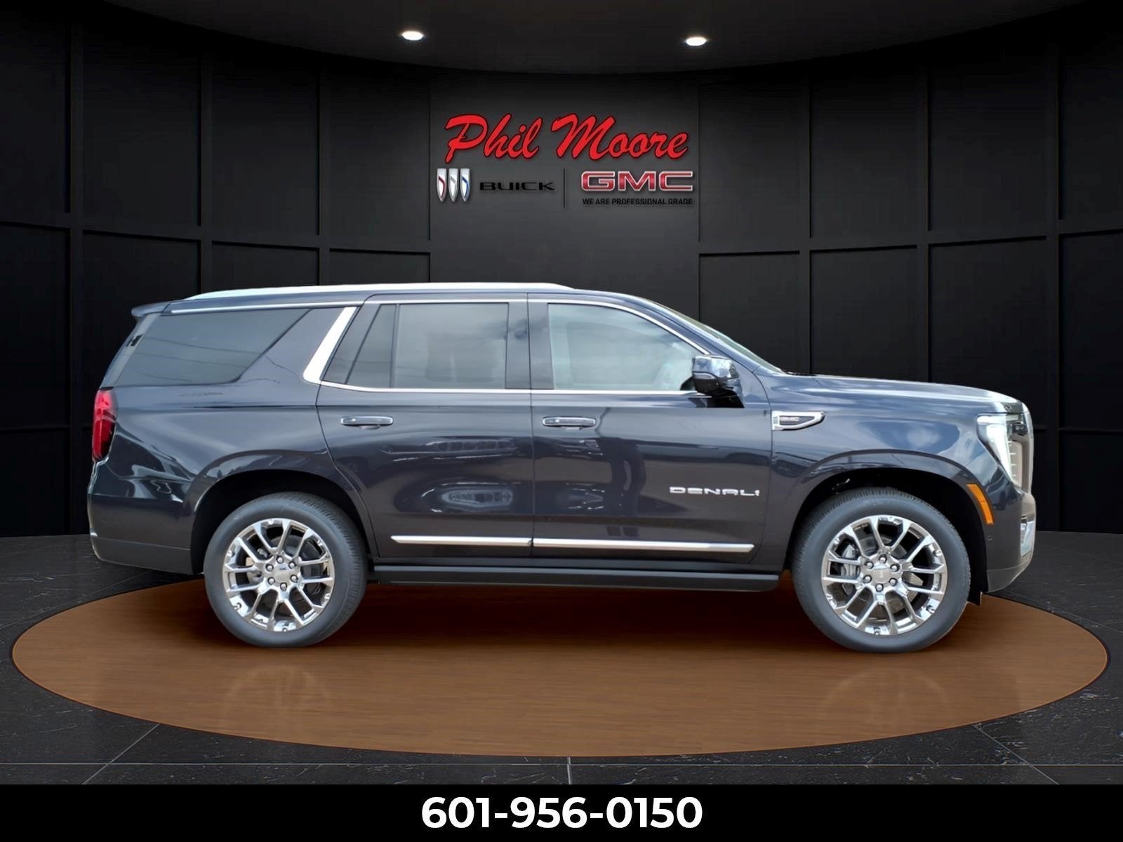 2026 GMC Yukon Denali in Titanium Rush Metallic — front three-quarter view