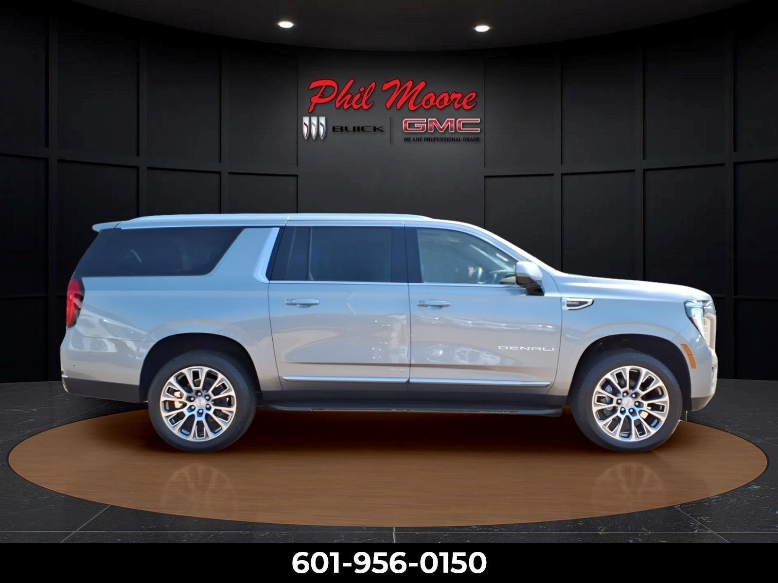 2026 GMC Yukon XL Denali in Sterling Metallic — front three-quarter view