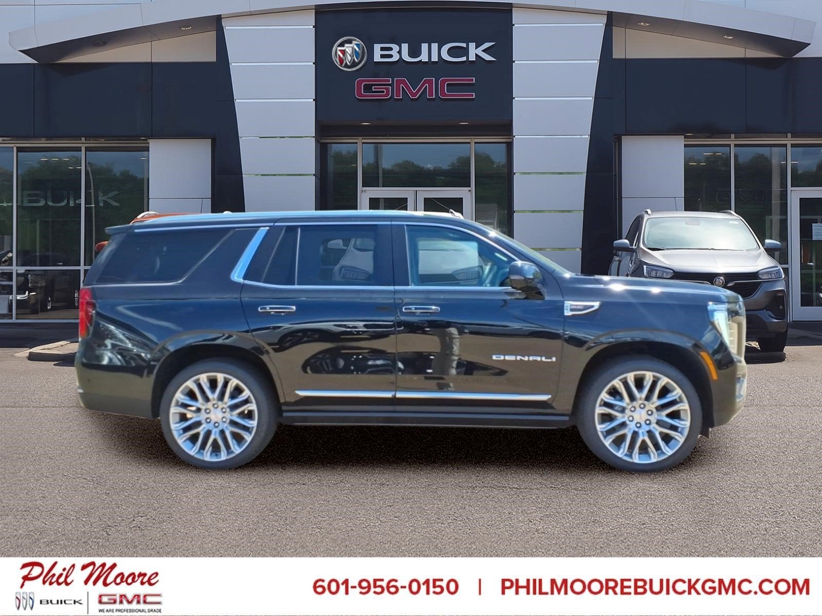 2026 GMC Yukon Denali in Onyx Black — front three-quarter view