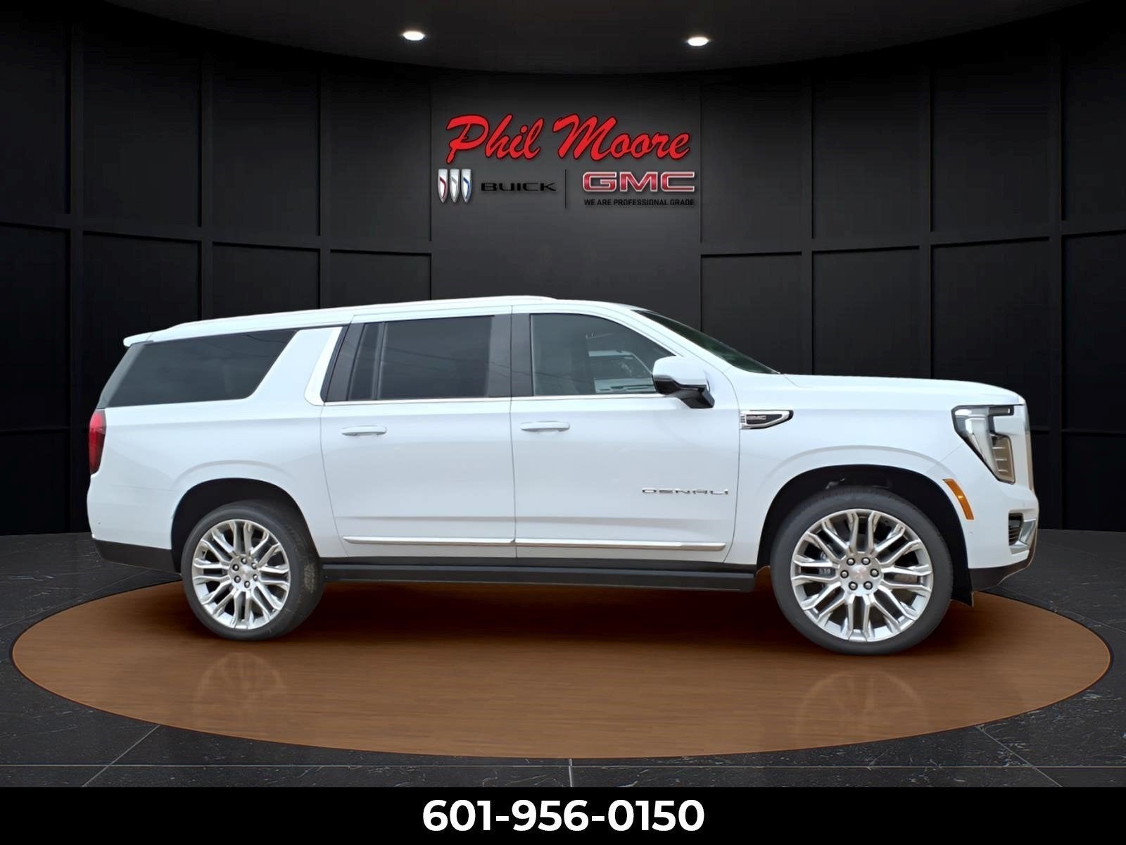 2026 GMC Yukon XL Denali in Glacier White Tricoat — front three-quarter view