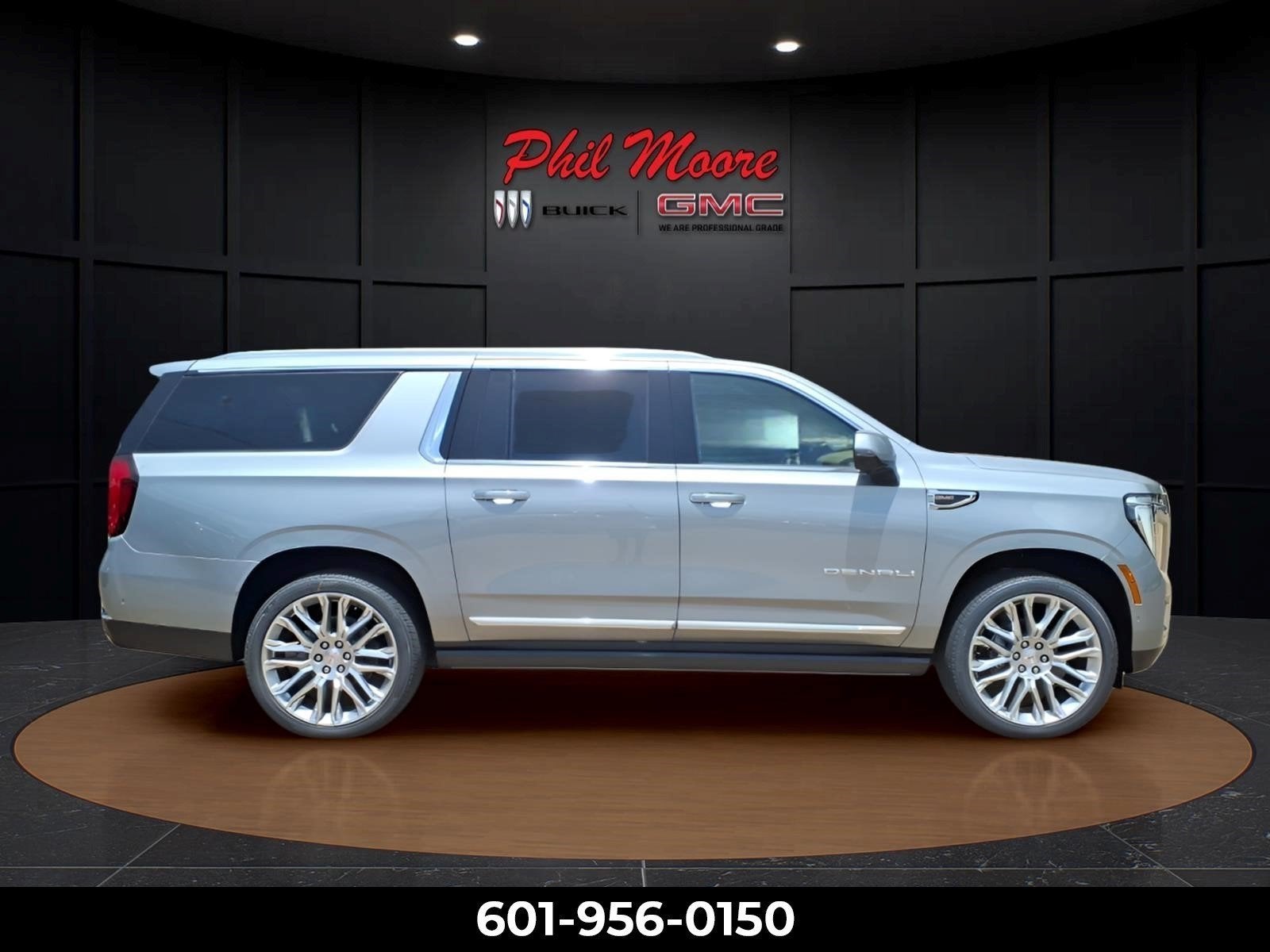 2026 GMC Yukon XL Denali in Sterling Metallic — front three-quarter view