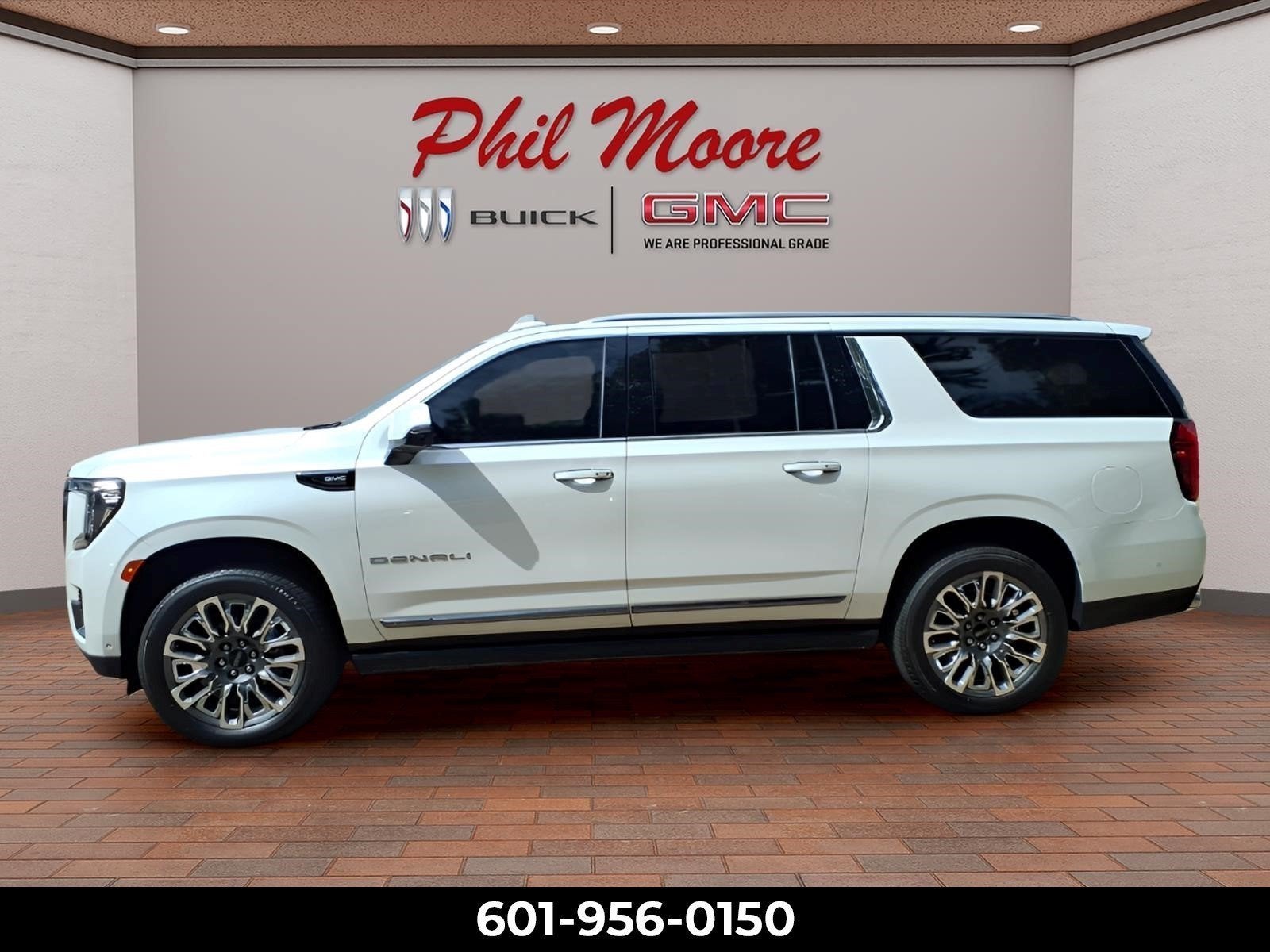 2023 GMC Yukon XL — rear three-quarter view