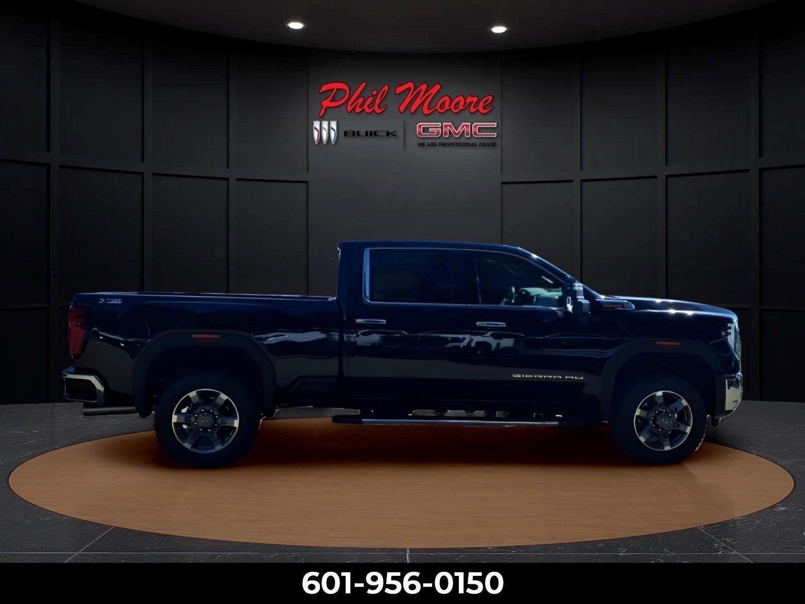 2026 GMC Sierra 2500 HD SLT in Onyx Black — front three-quarter view