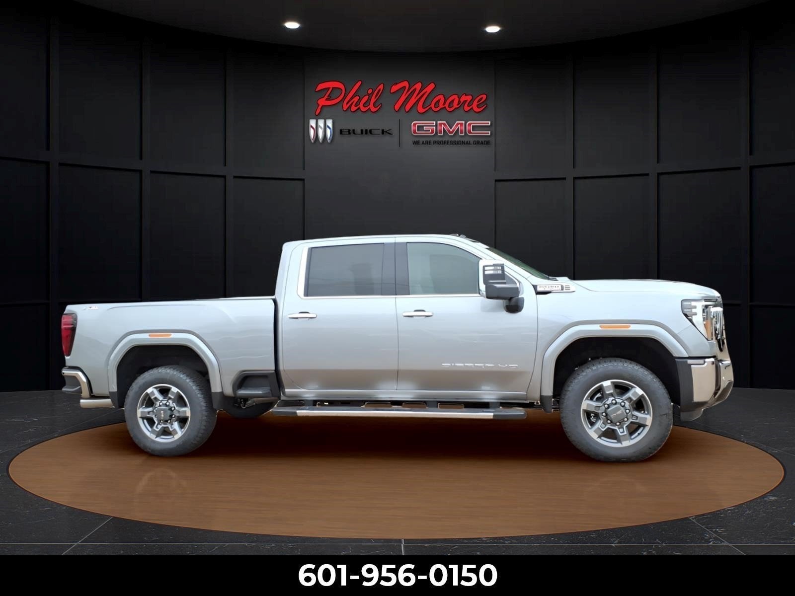 2026 GMC Sierra 2500 HD SLT in Sterling Metallic — front three-quarter view
