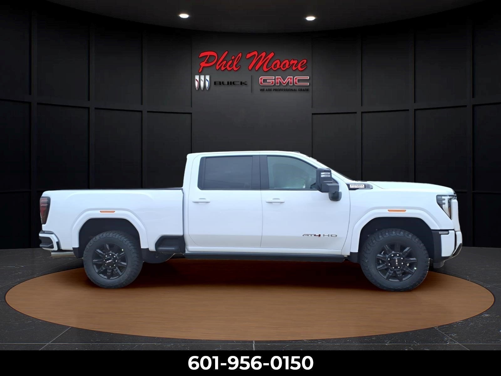 2026 GMC Sierra 2500 HD AT4 in Summit White — front three-quarter view