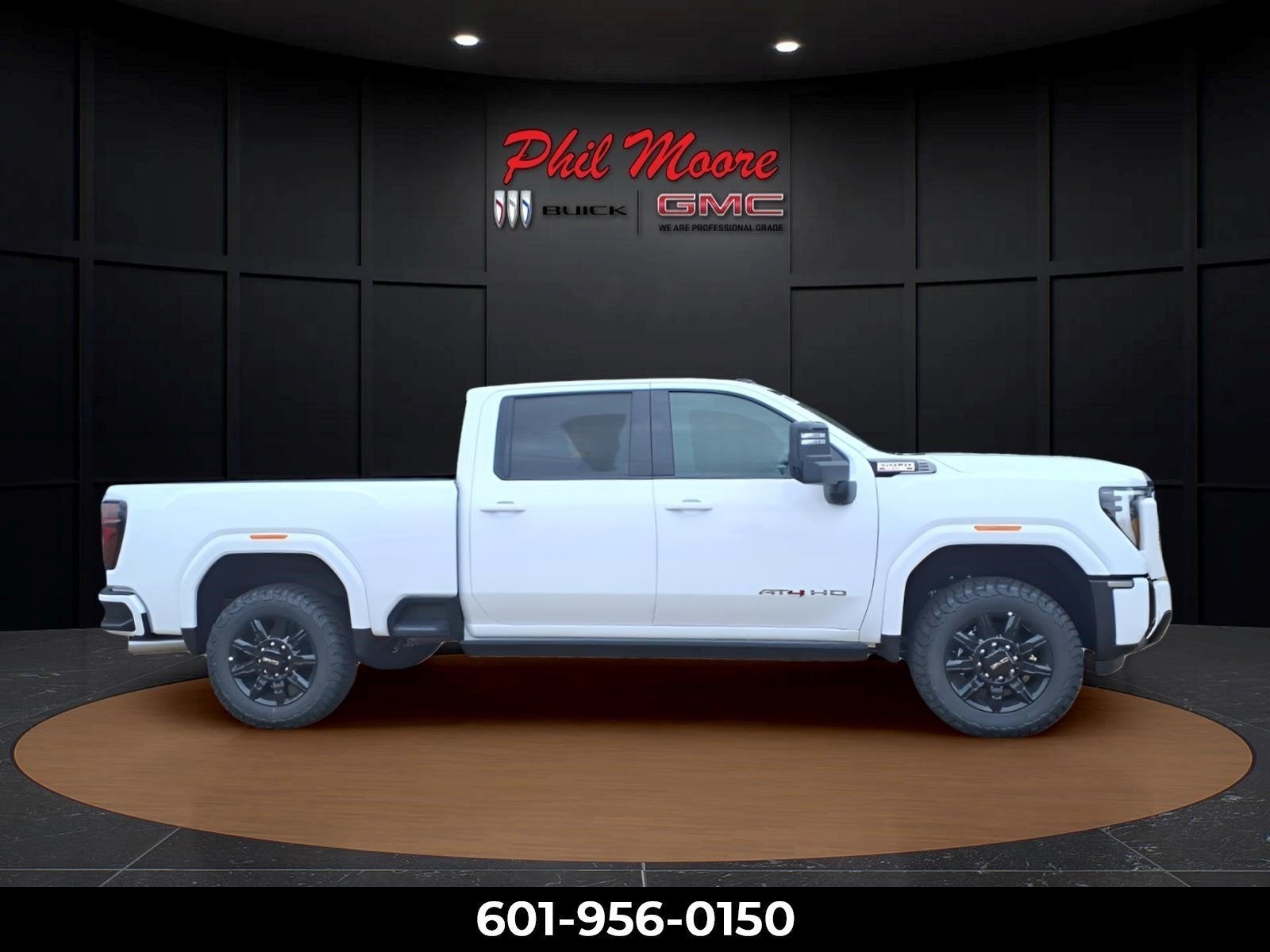 2026 GMC Sierra 2500 HD AT4 in Summit White — front three-quarter view