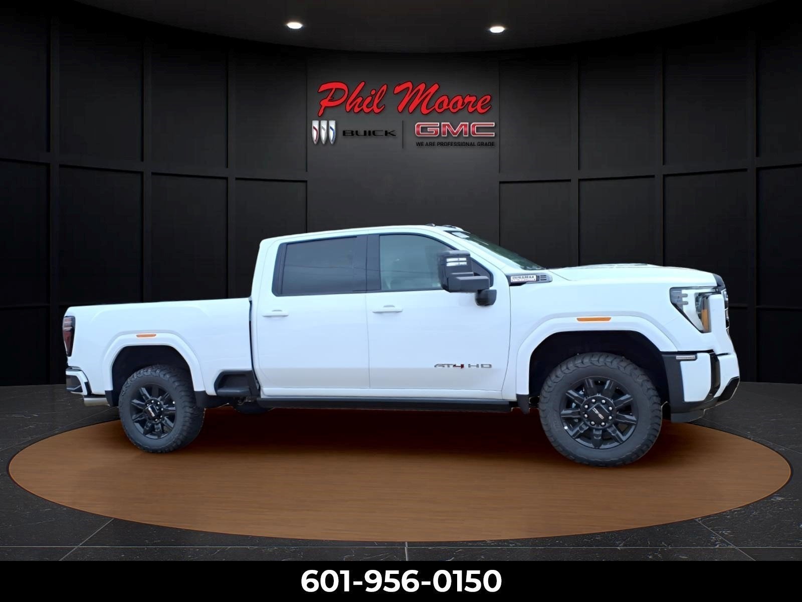 2026 GMC Sierra 2500 HD AT4 in Summit White — front three-quarter view