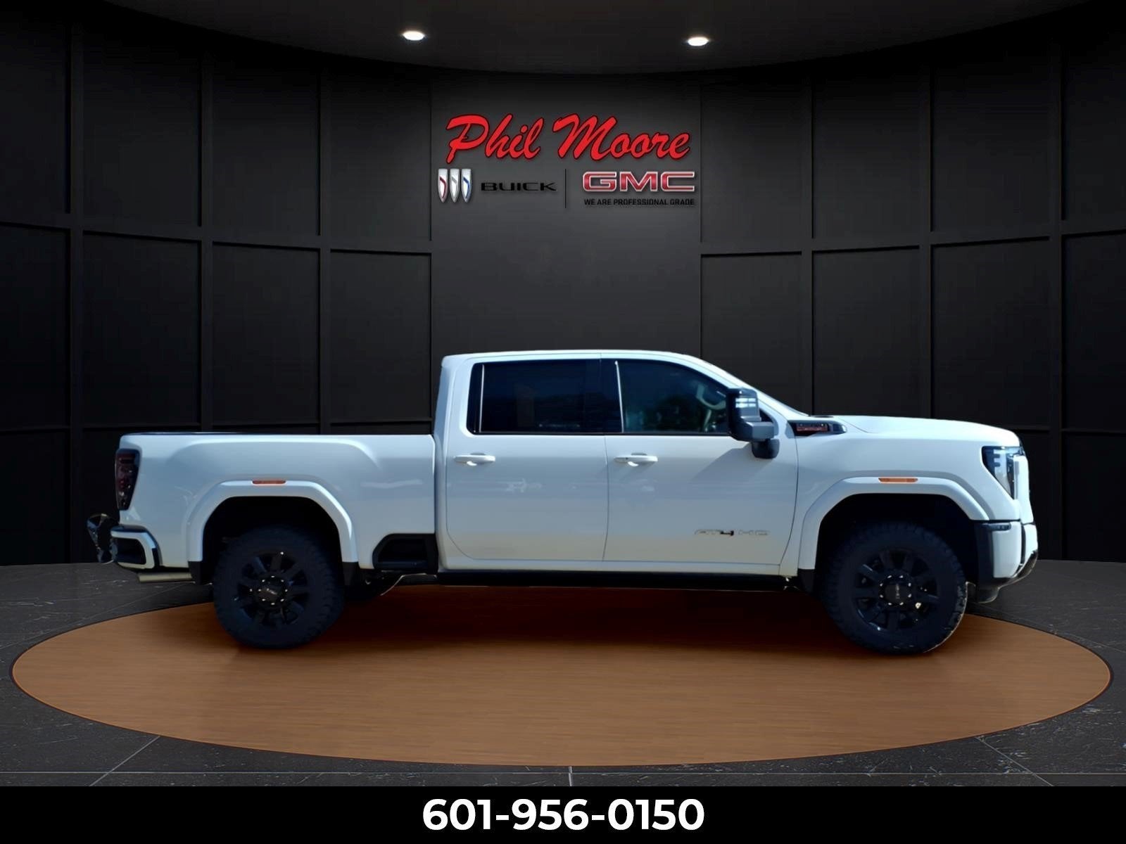 2026 GMC Sierra 2500 HD AT4 in Summit White — front three-quarter view