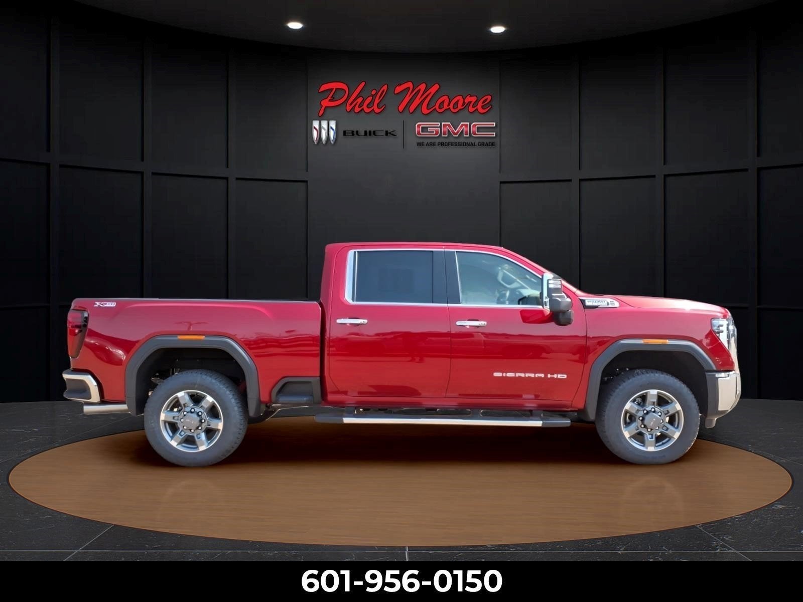 2026 GMC Sierra 3500 HD SLT in Volcanic Red Tintcoat — front three-quarter view