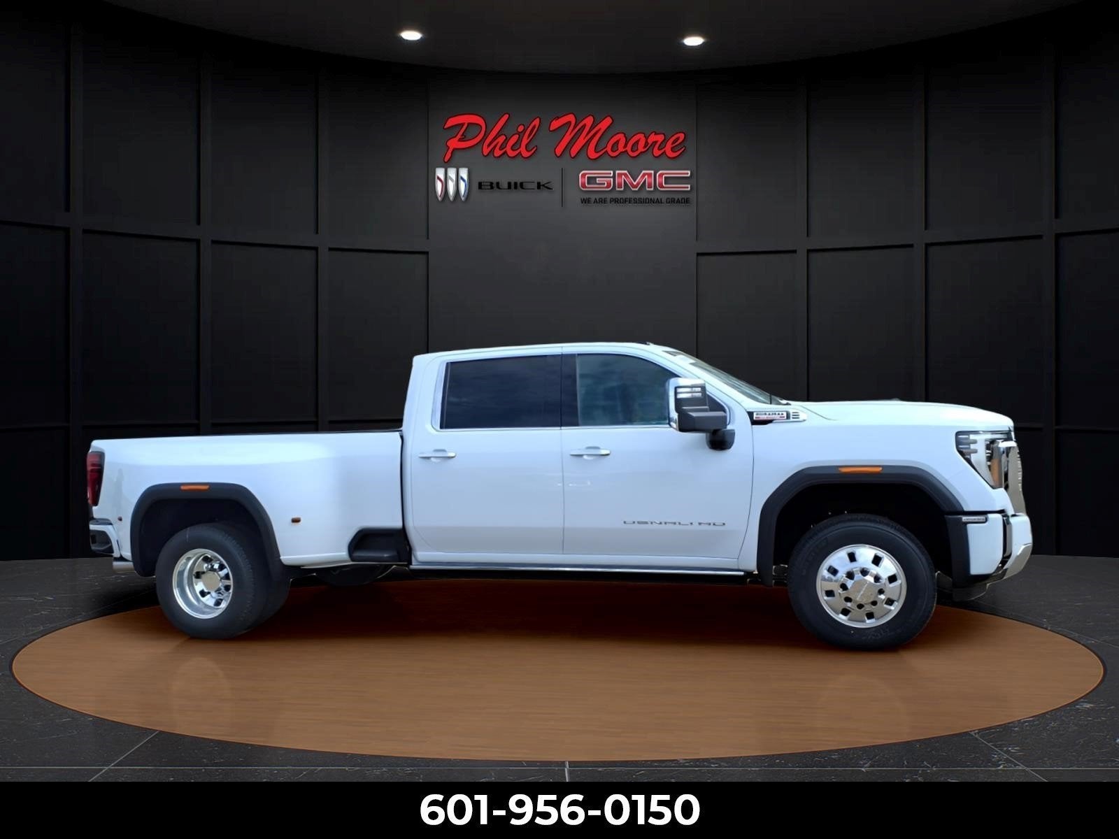 2026 GMC Sierra 3500 HD Denali DRW in Glacier White Tricoat — front three-quarter view