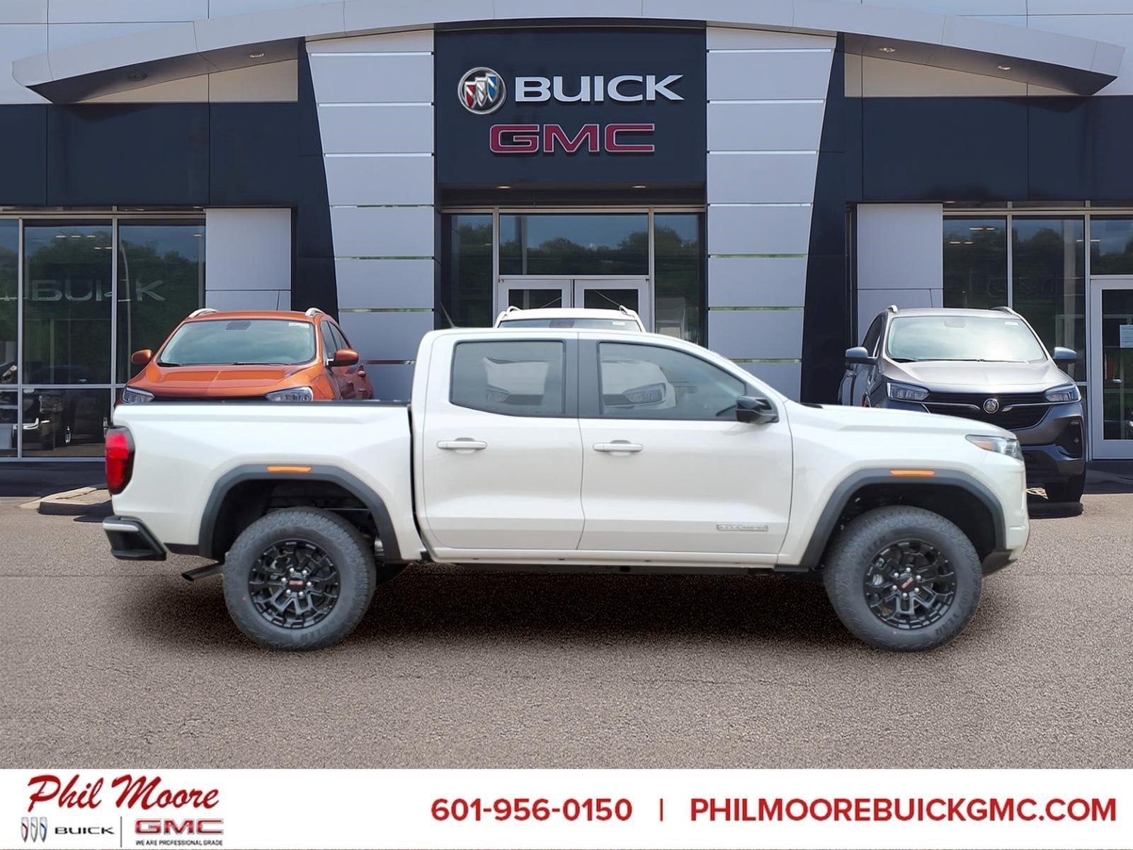 2026 GMC Canyon Elevation in Coastal Dune — front three-quarter view