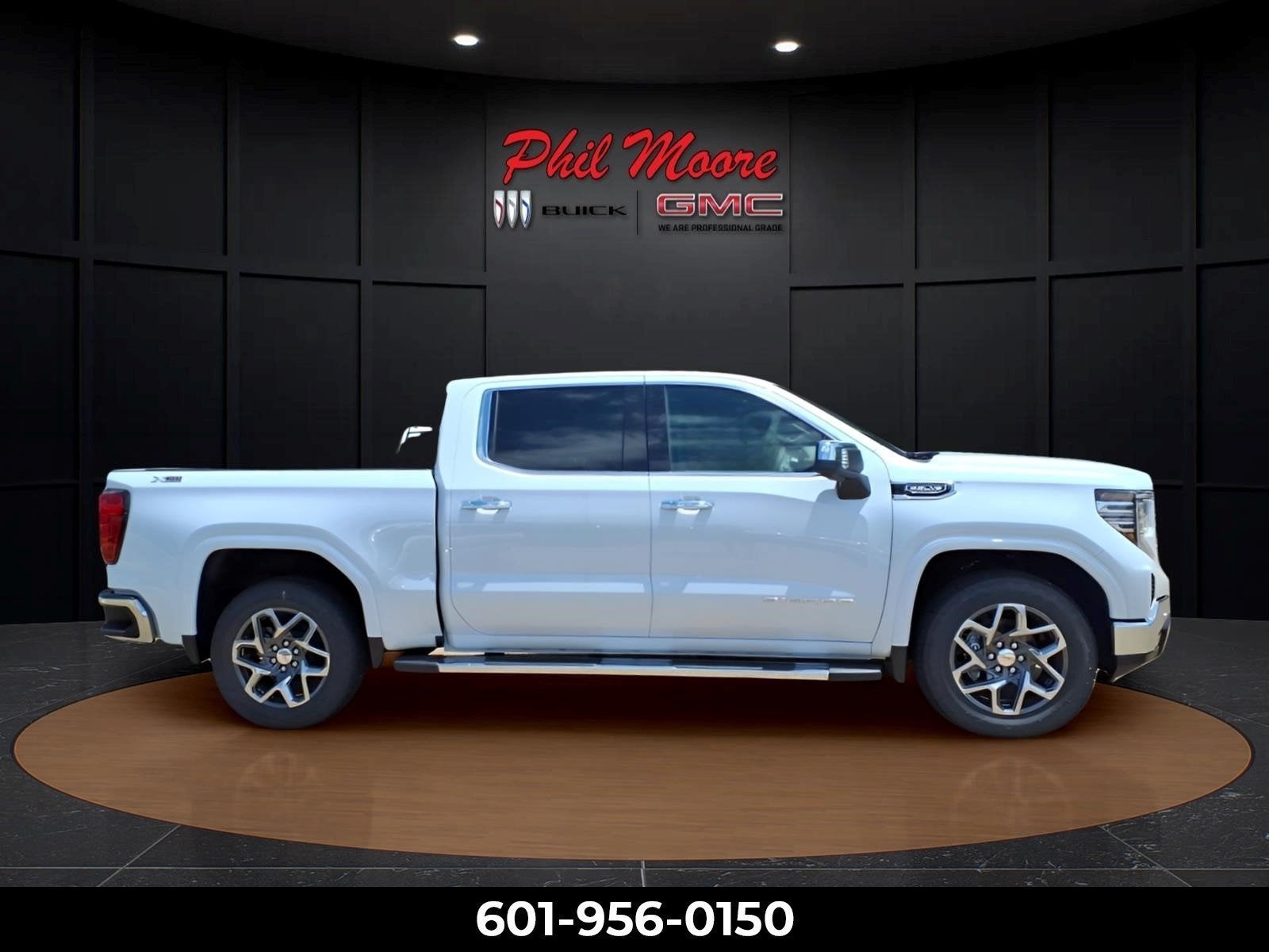 2026 GMC Sierra 1500 SLT in Glacier White Tricoat — front three-quarter view