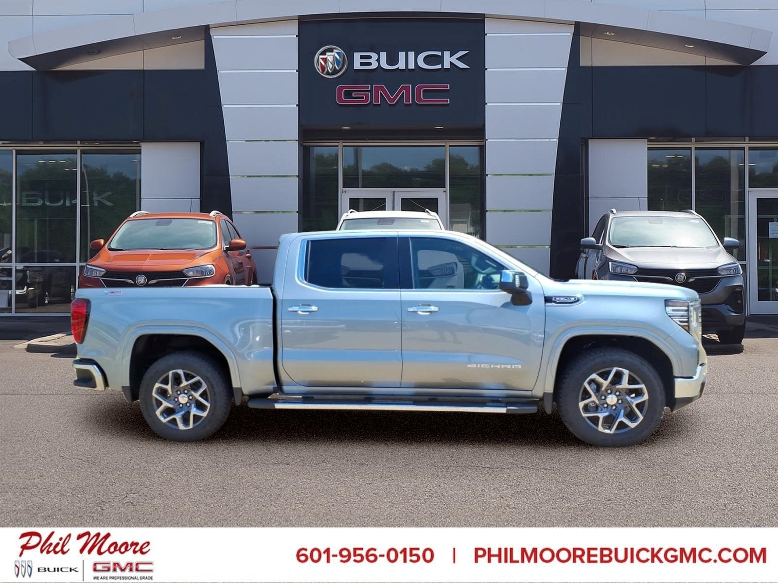 2026 GMC Sierra 1500 SLT in Sterling Metallic — front three-quarter view