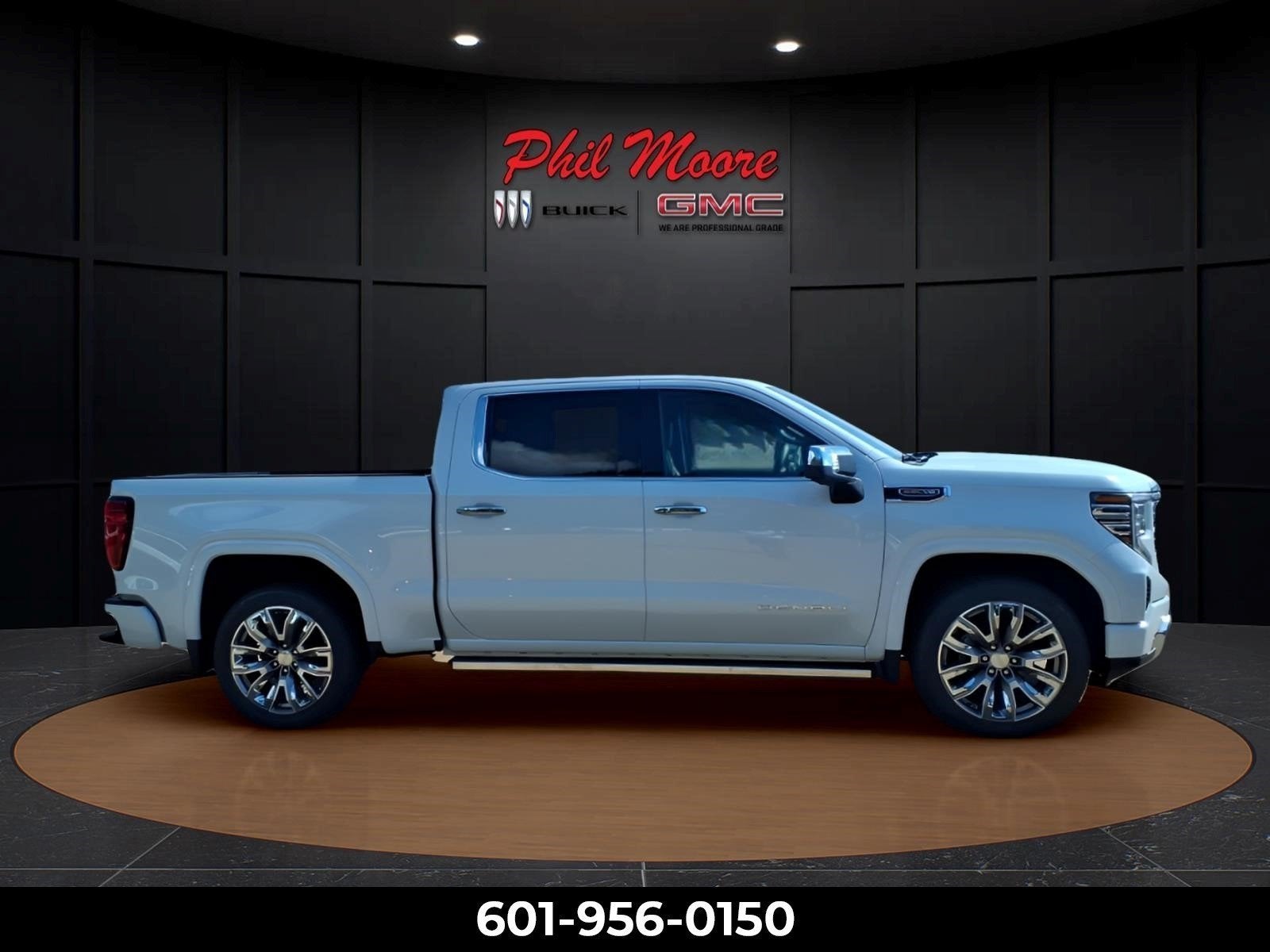 2026 GMC Sierra 1500 Denali in Glacier White Tricoat — front three-quarter view