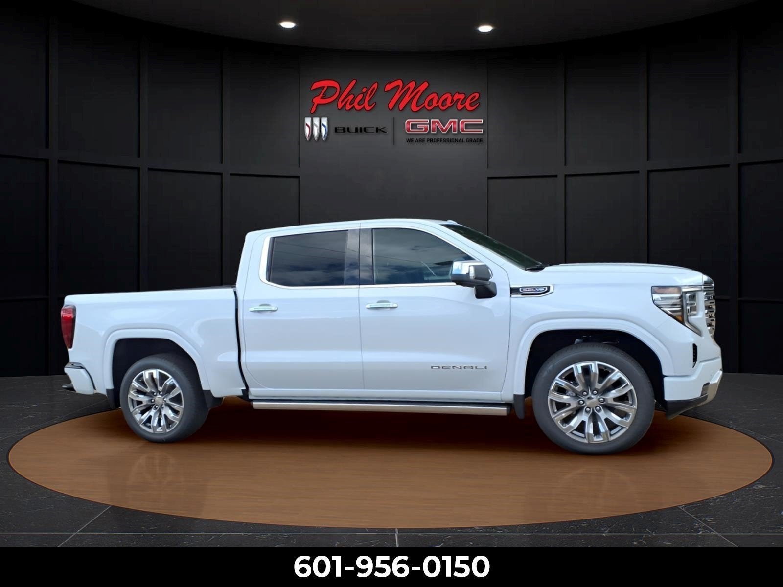 2026 GMC Sierra 1500 Denali in Glacier White Tricoat — front three-quarter view
