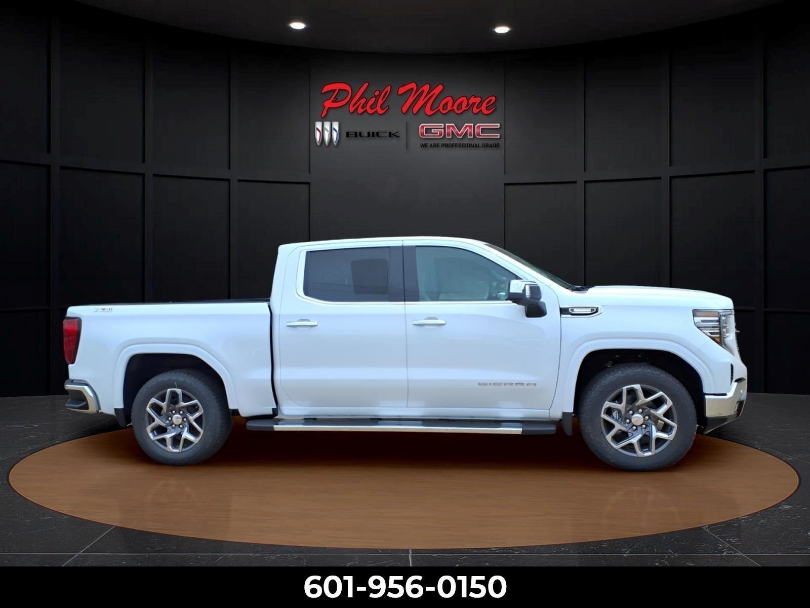 2026 GMC Sierra 1500 SLT in Glacier White Tricoat — front three-quarter view