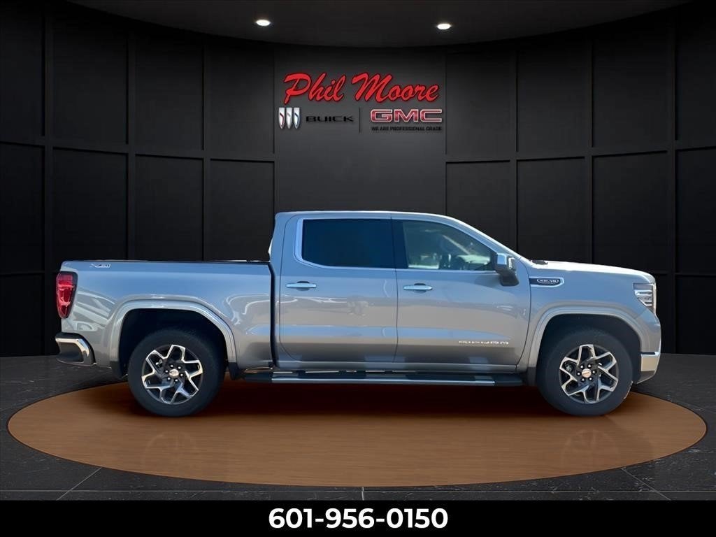 2025 GMC Sierra 1500 SLT in Sterling Metallic — front three-quarter view