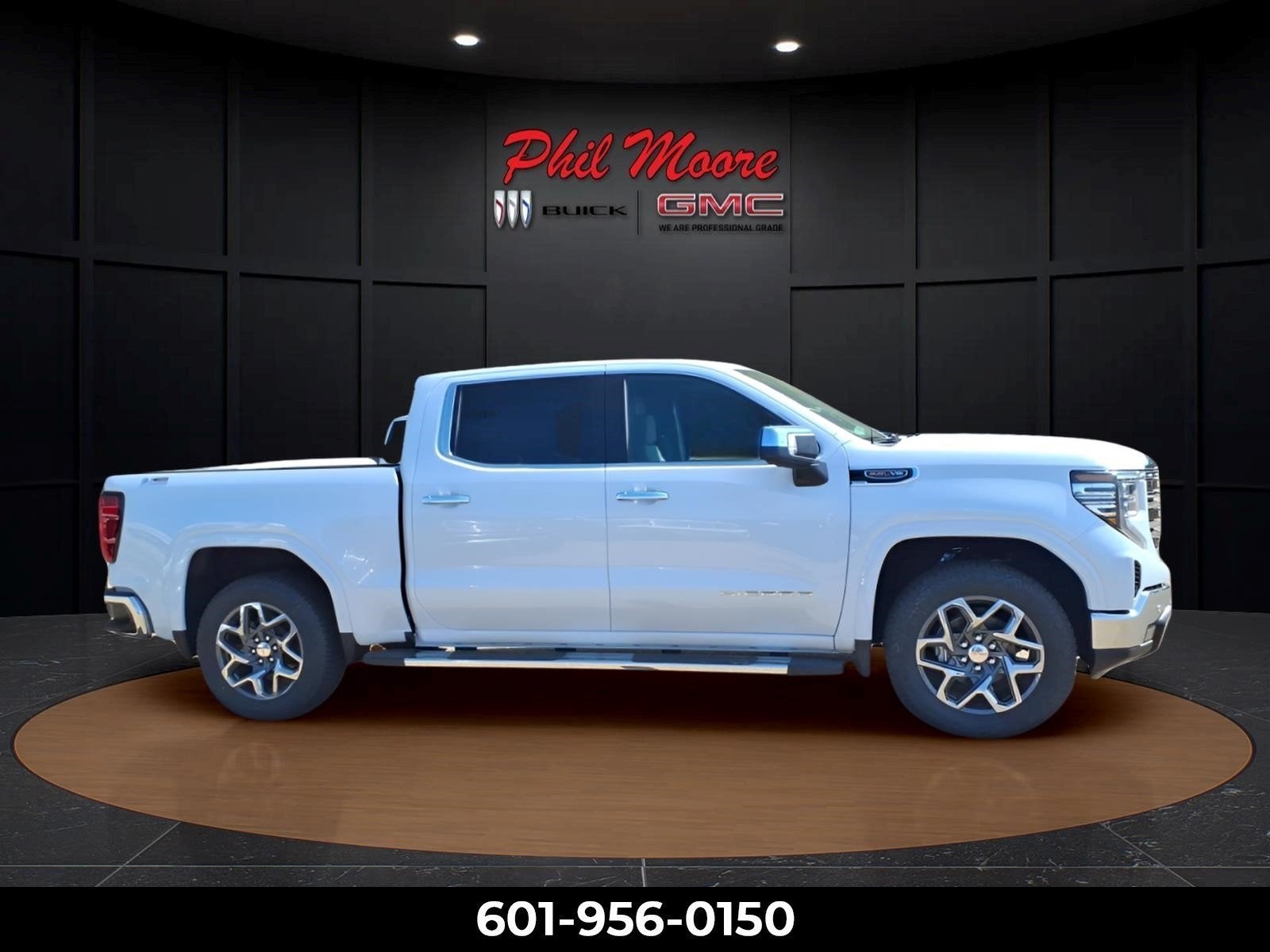 2026 GMC Sierra 1500 SLT in Glacier White Tricoat — front three-quarter view