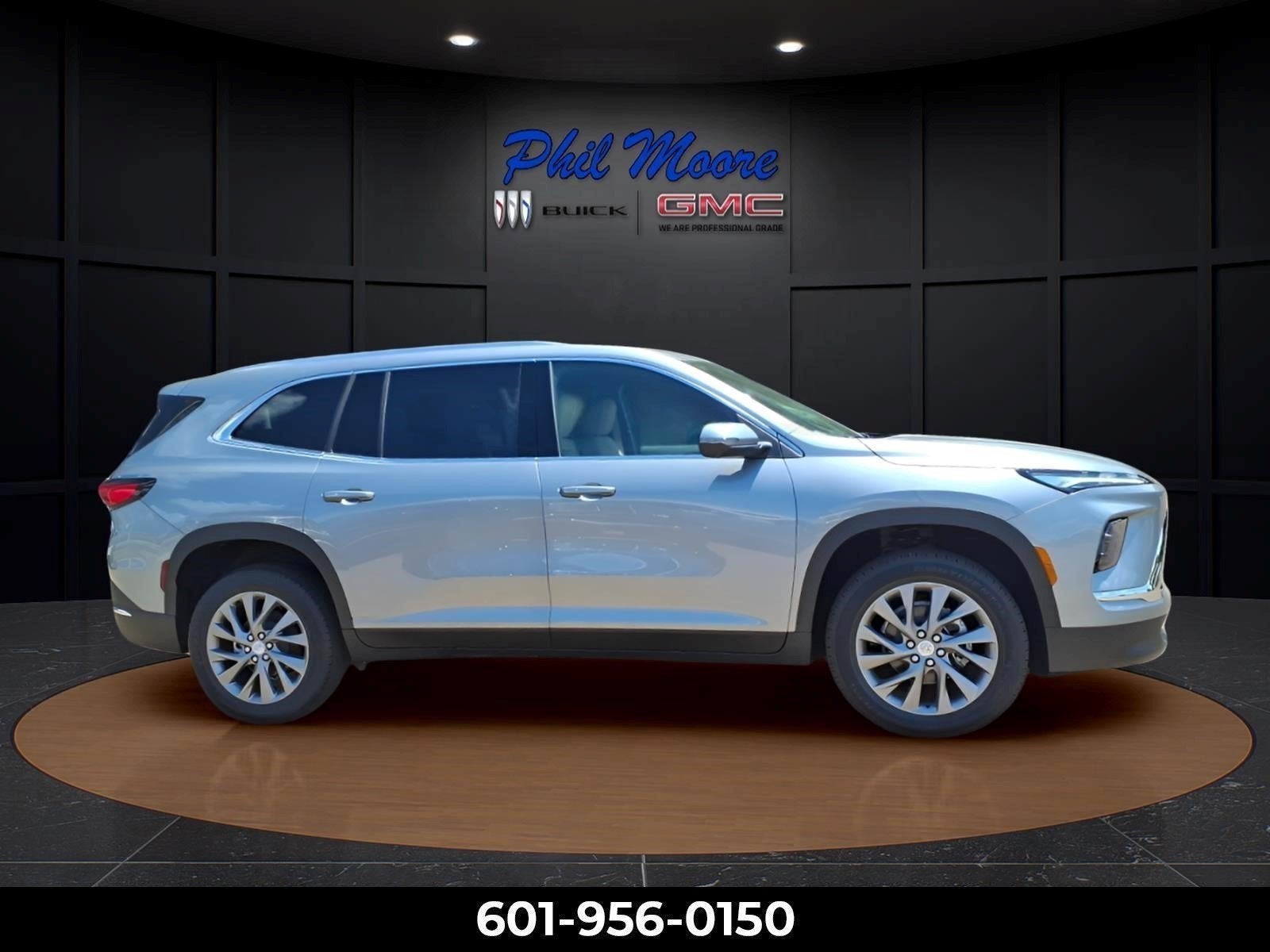 2026 Buick Enclave Preferred in Moonstone Gray Metallic — front three-quarter view