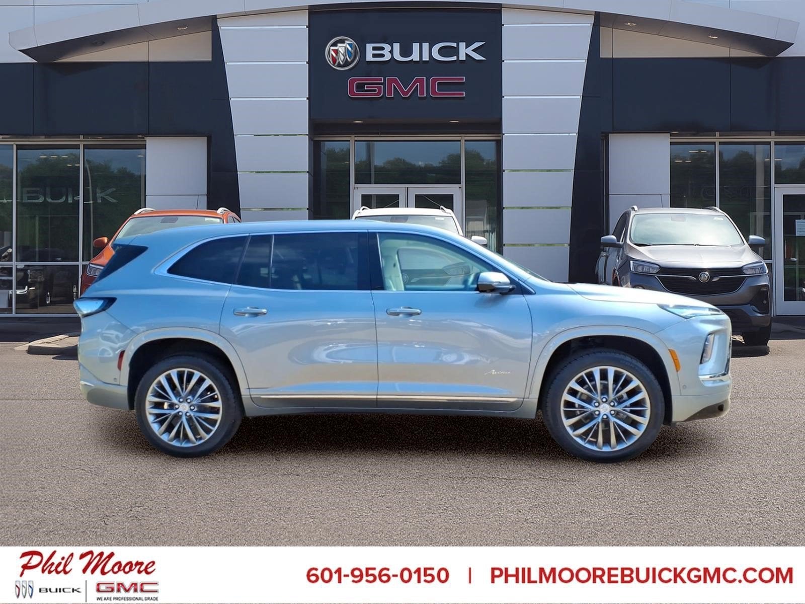 2026 Buick Enclave Avenir in Moonstone Gray Metallic — front three-quarter view