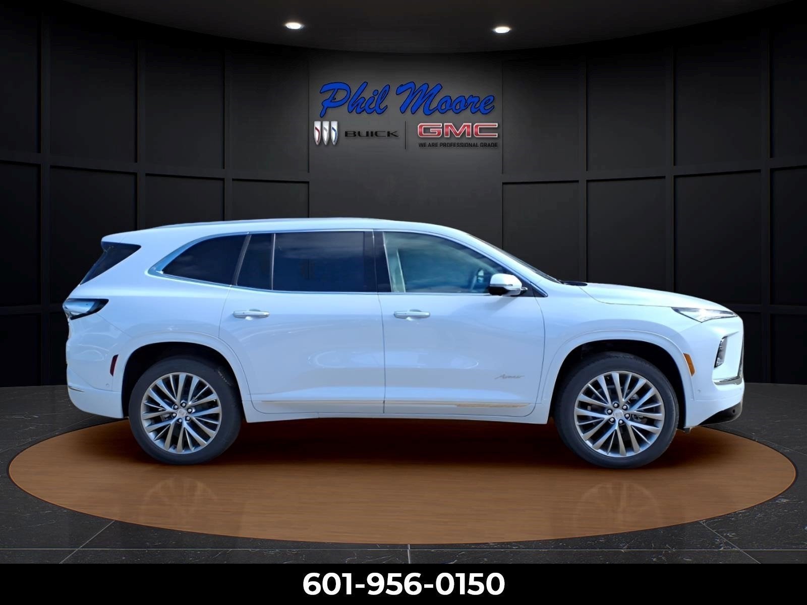 2026 Buick Enclave Avenir in Iridescent White Tricoat — front three-quarter view