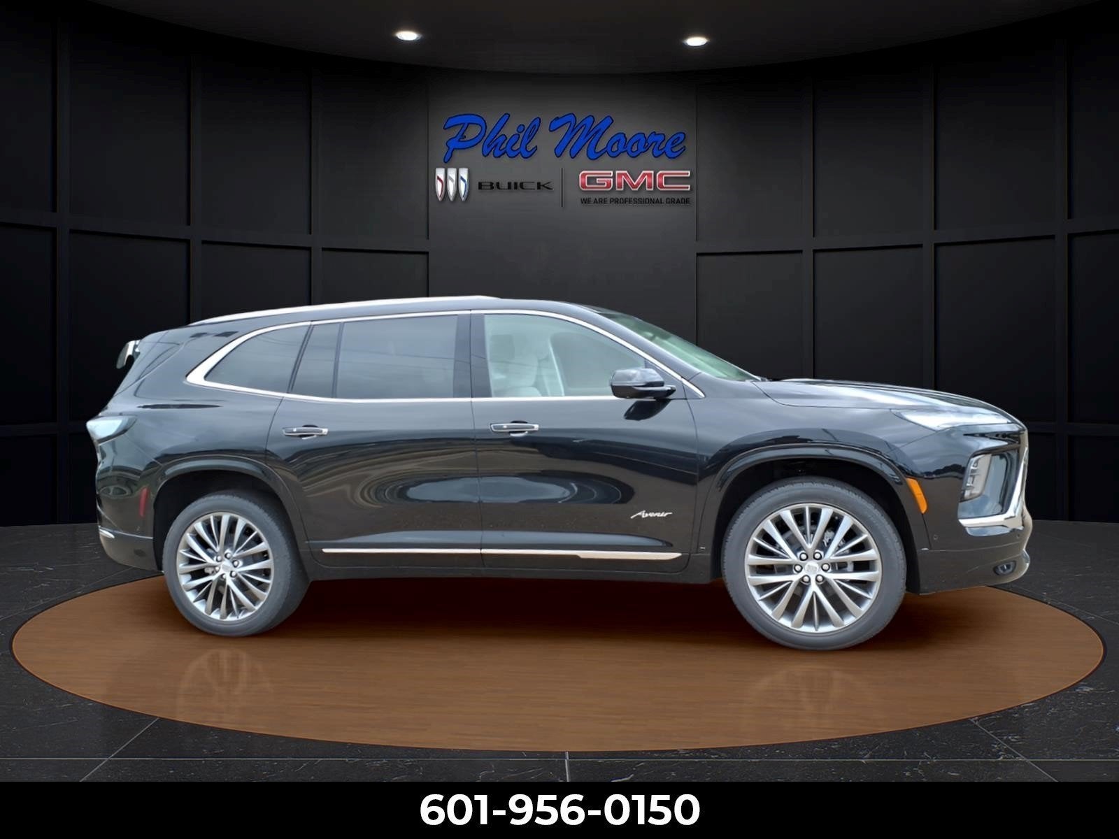 2026 Buick Enclave Avenir in Ebony Twilight Metallic — front three-quarter view