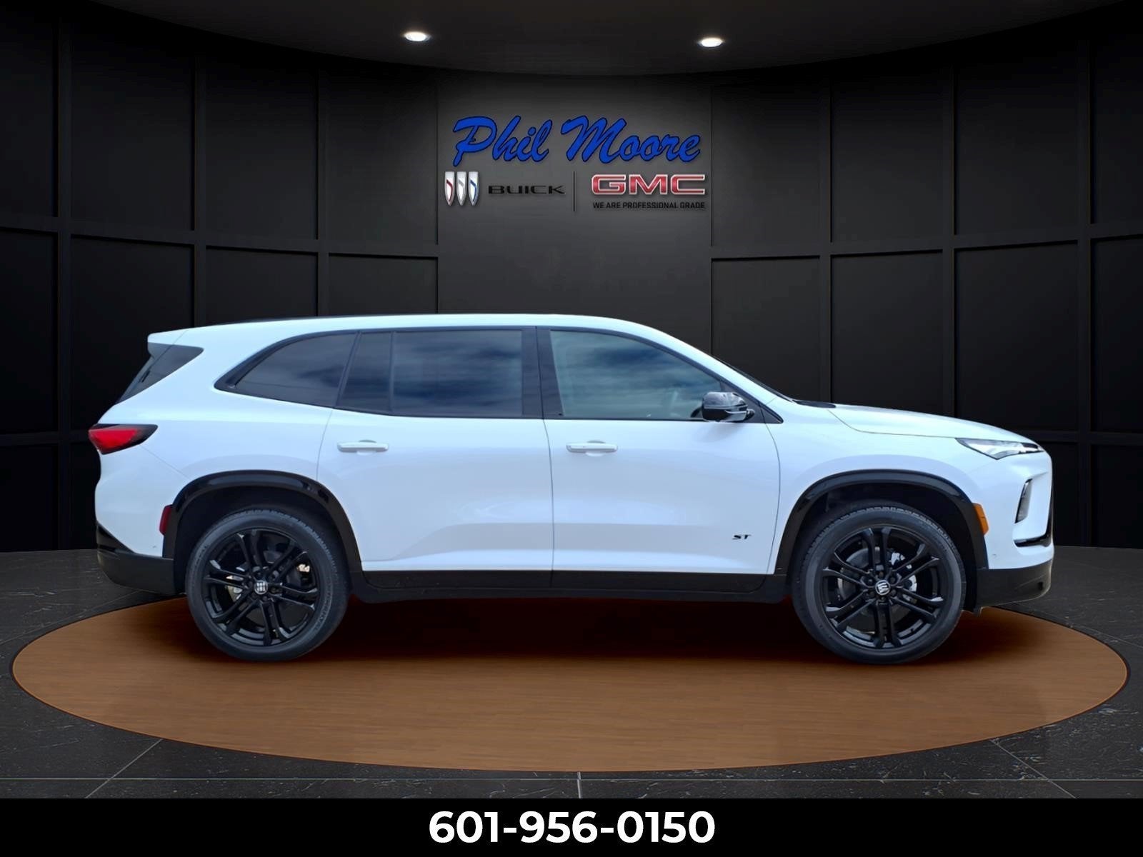 2026 Buick Enclave Sport Touring in Iridescent White Tricoat — front three-quarter view