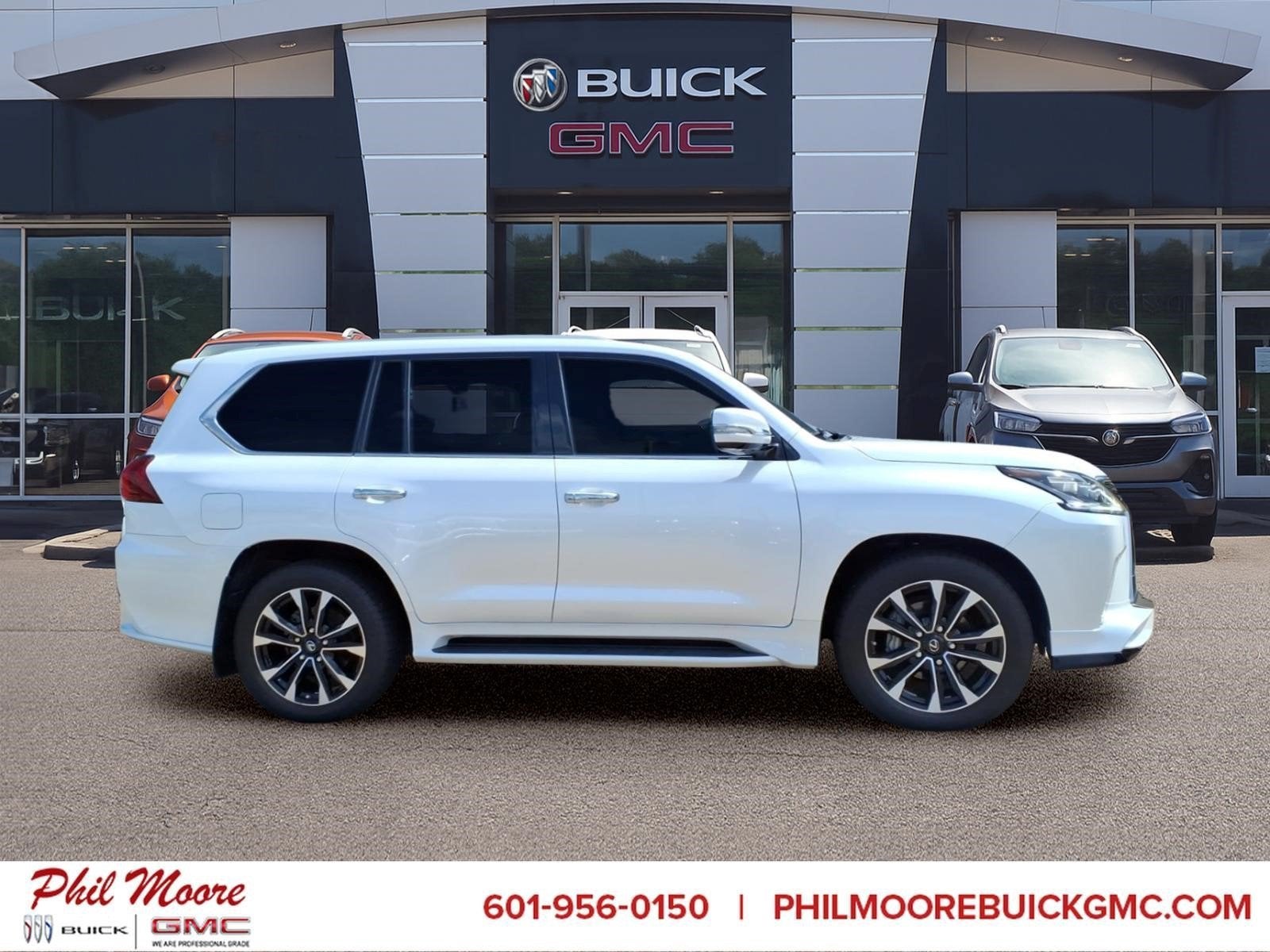 2021 Lexus LX 570 Three-Row in White — front three-quarter view