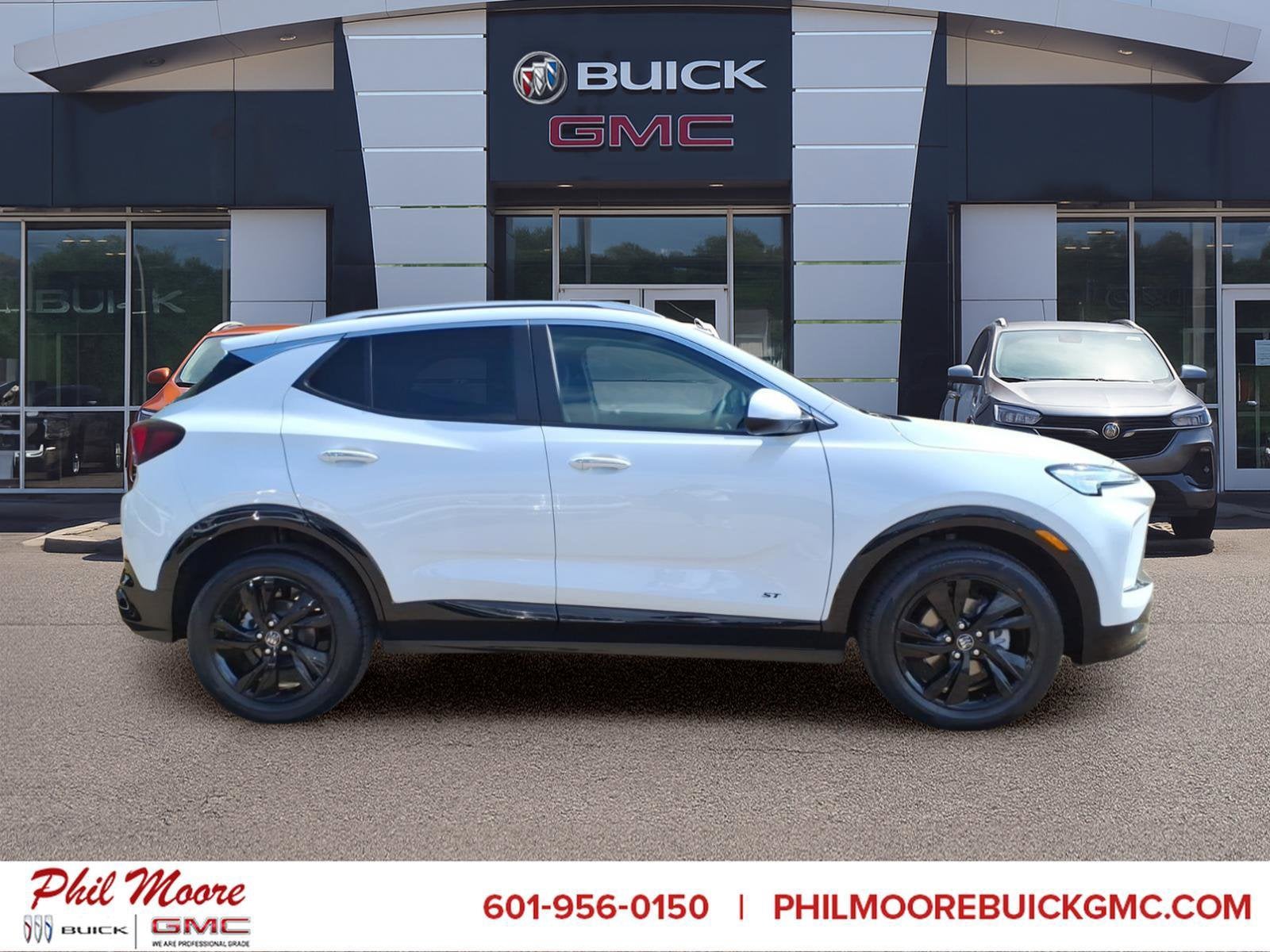 2026 Buick Encore GX Sport Touring in Summit White — front three-quarter view