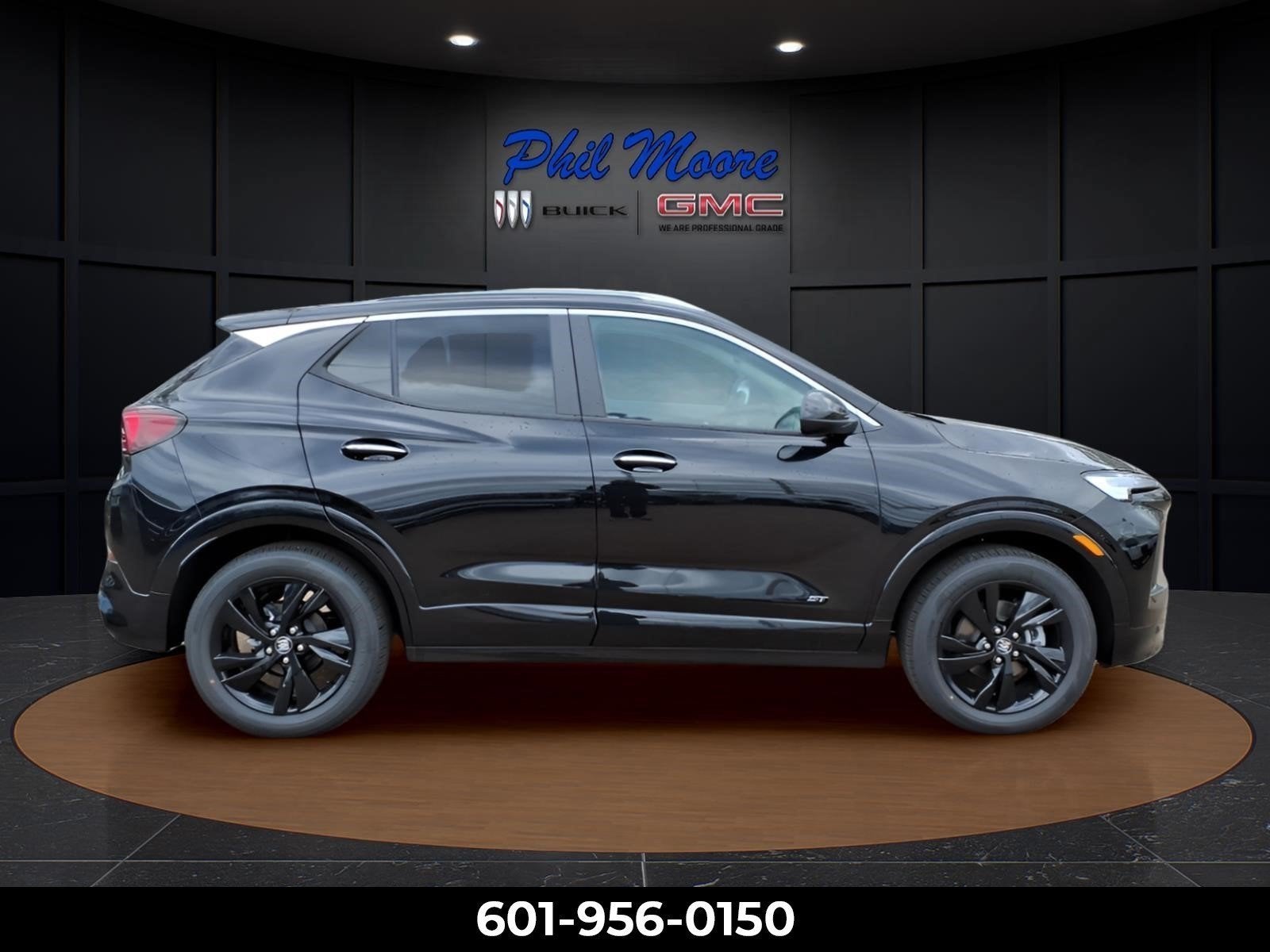 2026 Buick Encore GX Sport Touring in Ebony Twilight Metallic — front three-quarter view